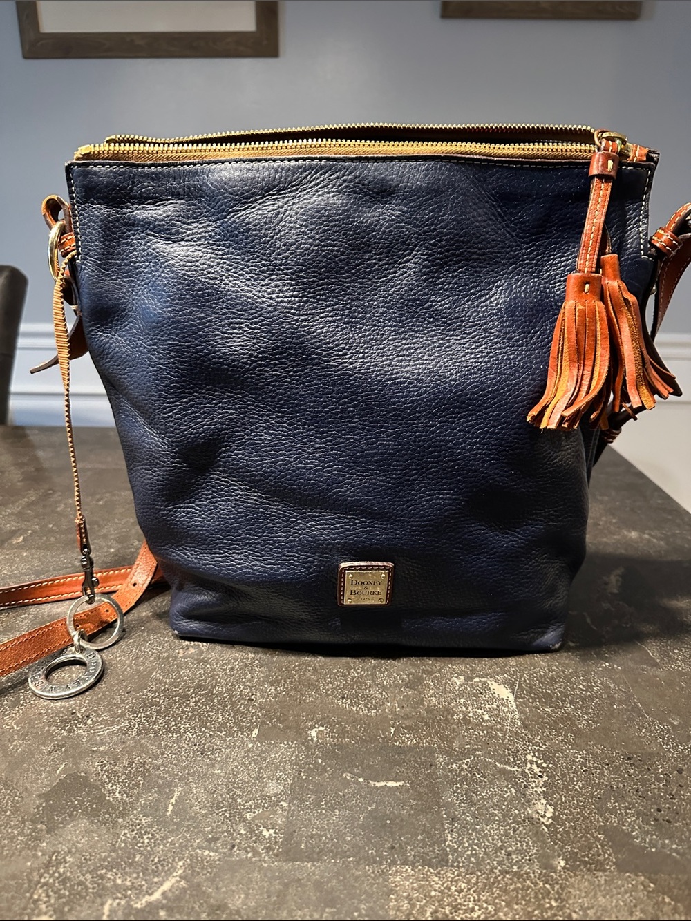 Dooney & Bourke Navy Leather Crossbody with Brown Tassel Accent